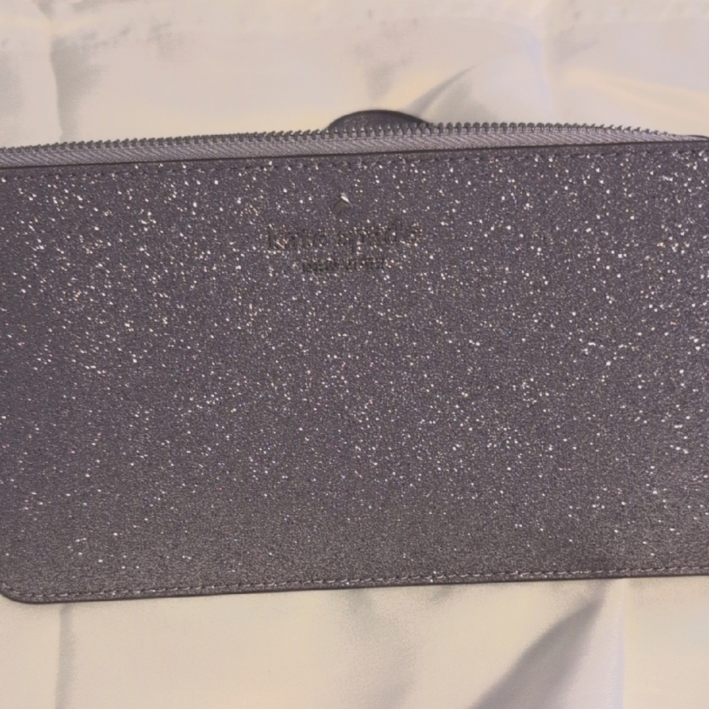 Kate Spade Sparkling lilac silver metalic wristlet